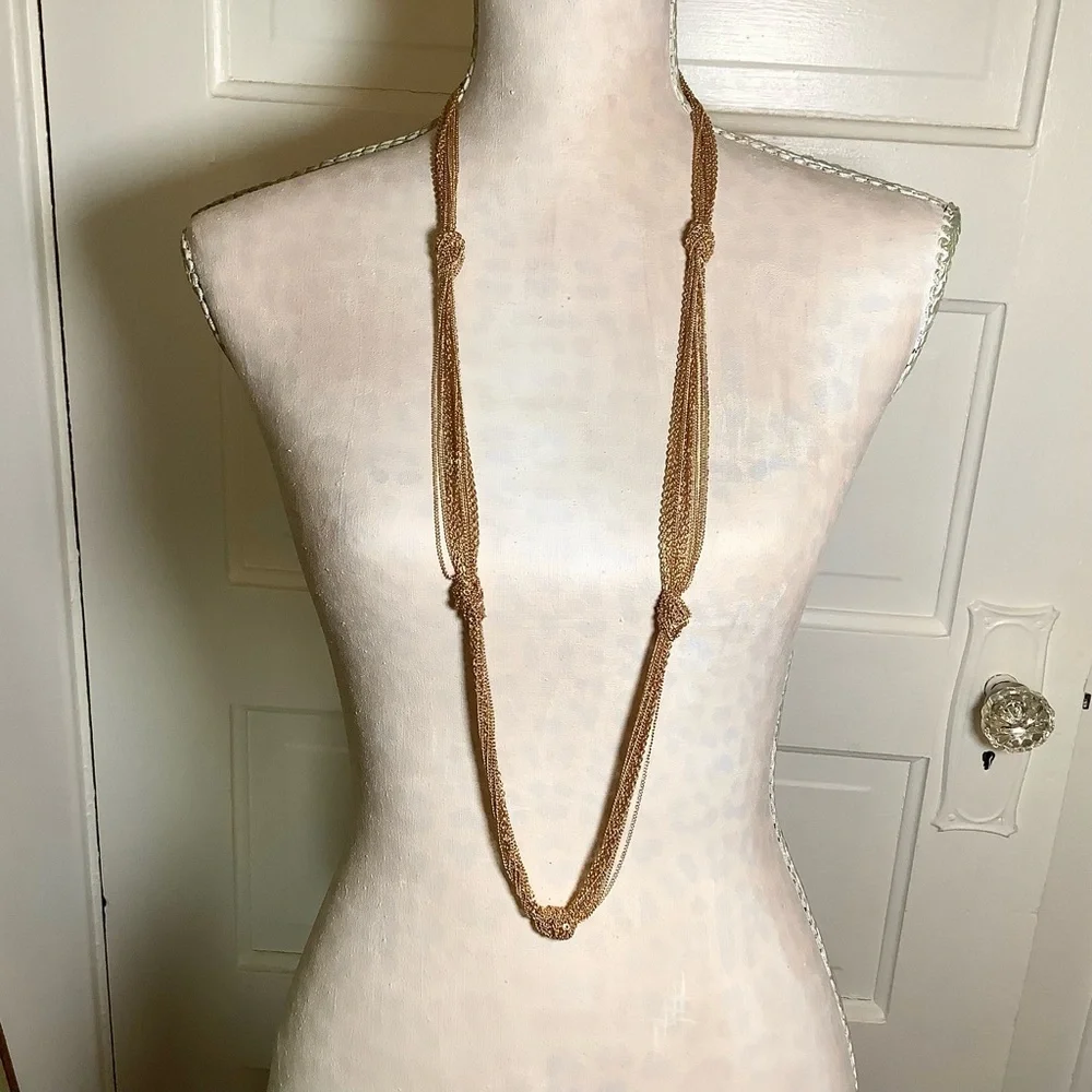 EL by Erica Lyons Gold Tone Long Knotted Statement Necklace 41-45 Inches Adjust